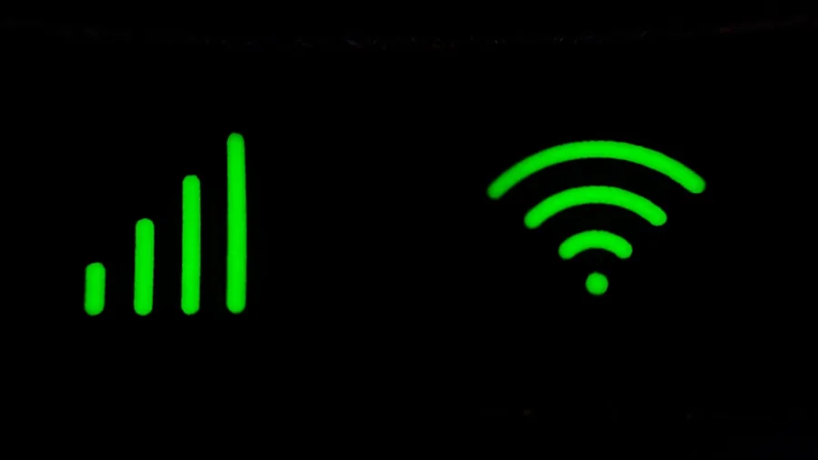 Person using wireless technology in everyday setting, demonstrating modern connectivity