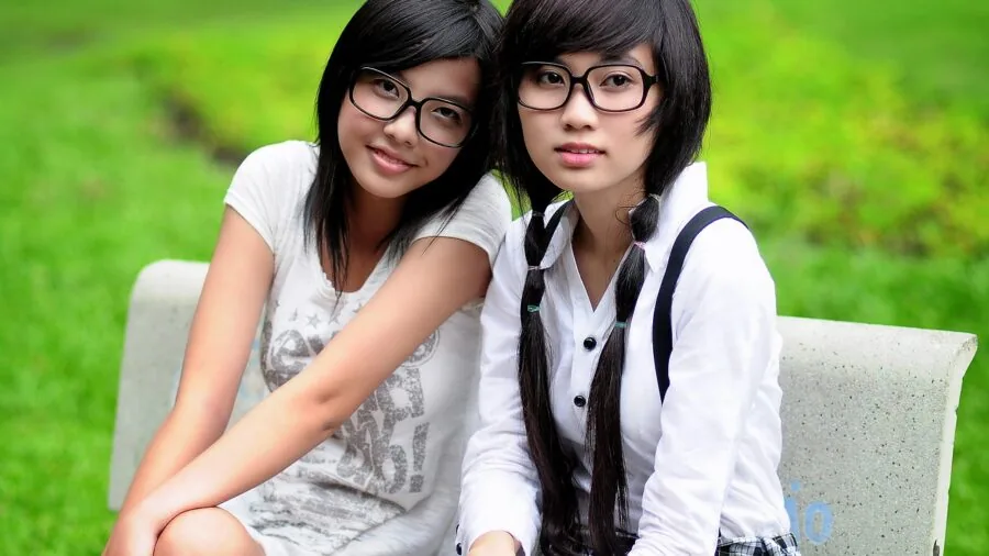 Person wearing fashionable glasses while enjoying outdoor activity, demonstrating comfortable fit and aesthetic appeal