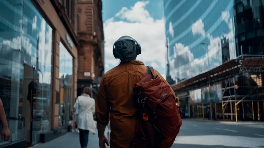 Person wearing noise cancelling headphones in a busy city street, demonstrating real-world active noise cancellation use
