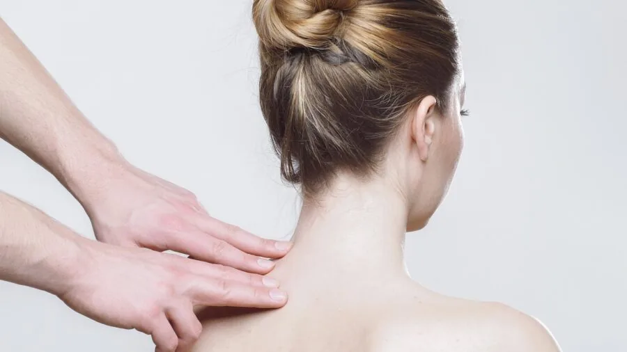 Person with glossy, healthy hair texture after conditioning treatment, demonstrating hair care benefits