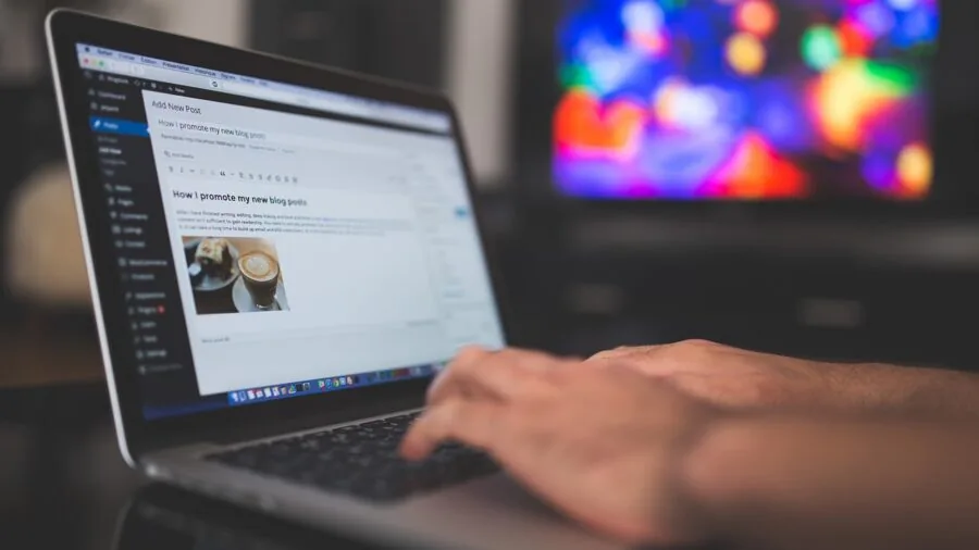Person working at desk with proper hand and wrist positioning during typing session