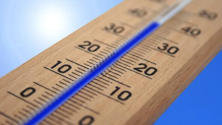 Person working outdoors in harsh weather conditions, demonstrating environmental challenges and durability needs