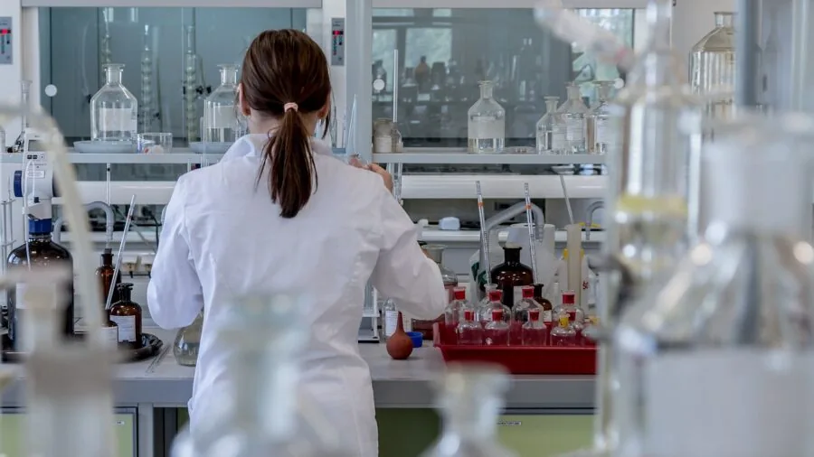 Professional electronics workbench with tools and equipment in a modern laboratory setting