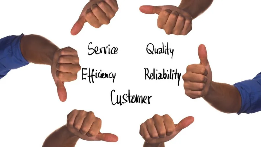 Professional evaluating electronics with trust and confidence in modern workspace