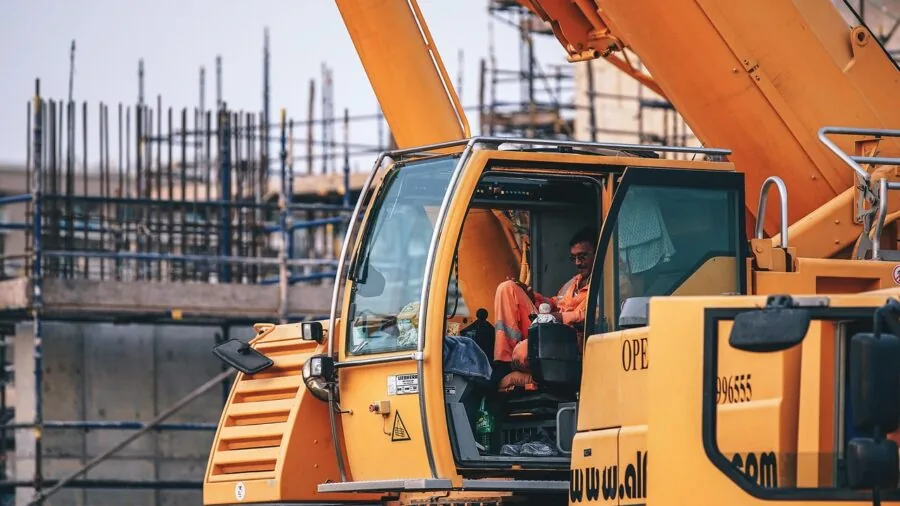 Professional evaluating tools and equipment options for business purchase decision