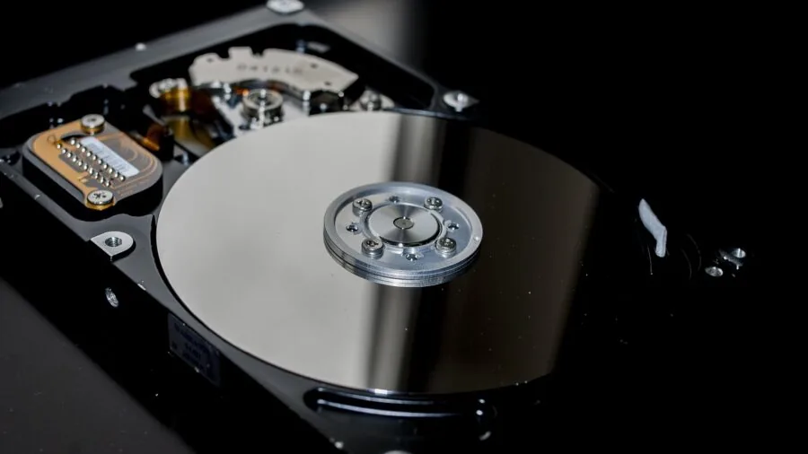 Professional organizing digital files and data backup systems across different devices and storage solutions