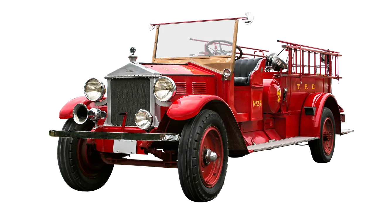 Red fire extinguisher mounted inside car interior dashboard area