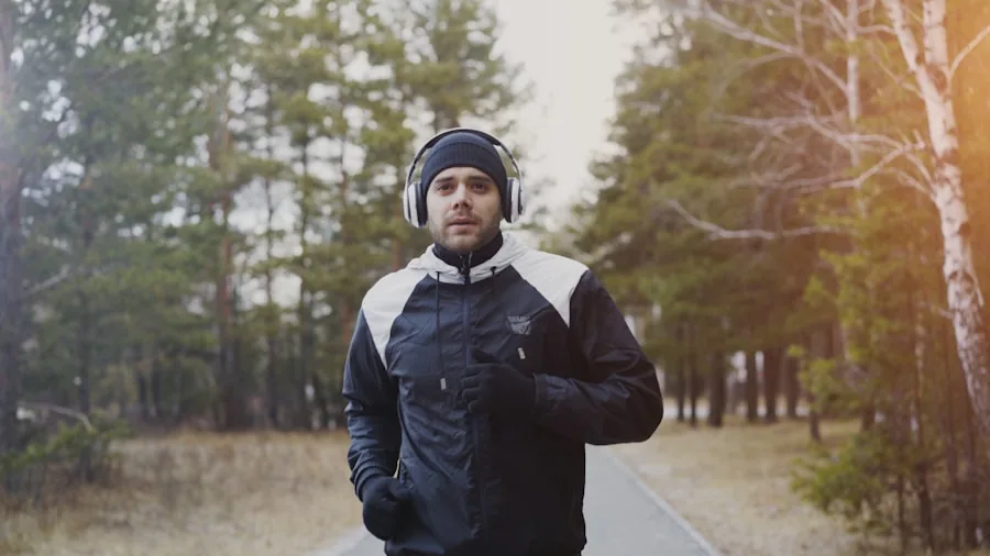 Runner preparing for workout with wireless headphones and charging case