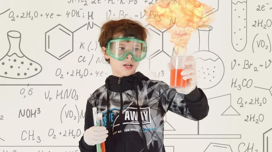 Scientist conducting chemical mixing experiment in modern laboratory setting with glass beakers and equipment