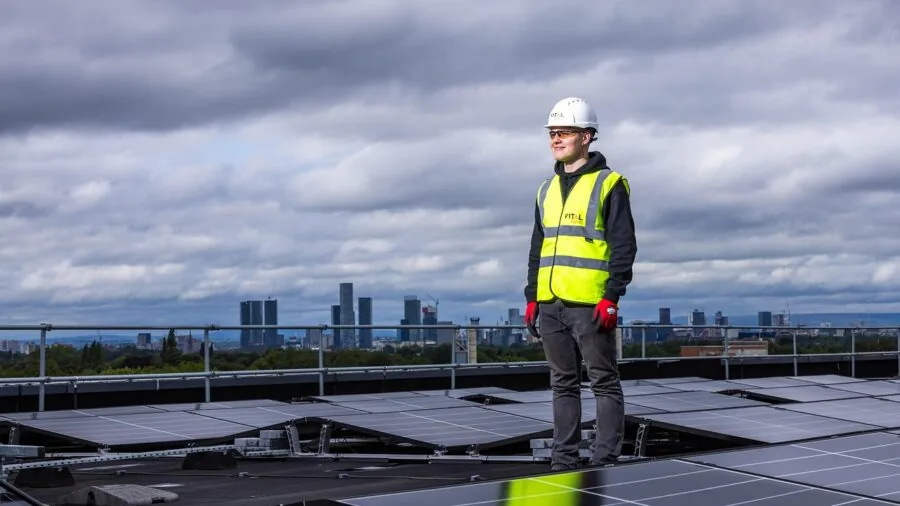 Solar panels charging power battery in outdoor natural setting during daylight