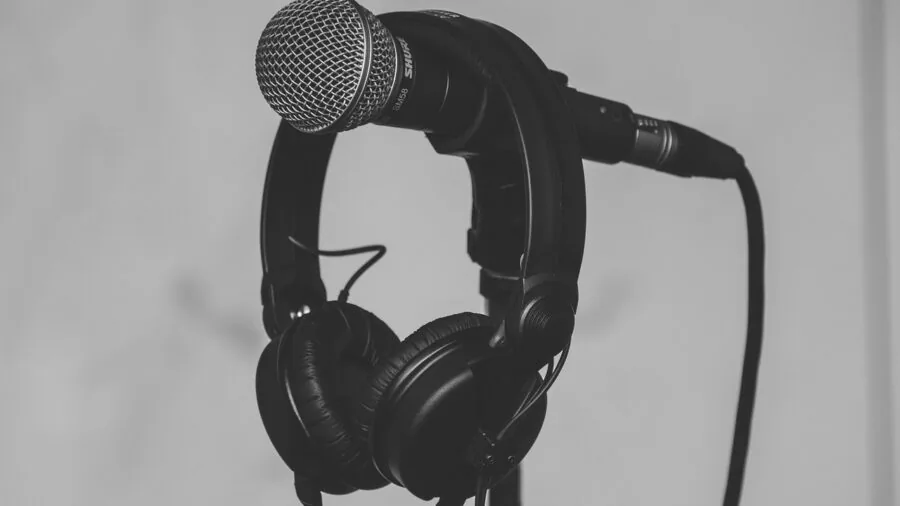 Someone examining and testing audio equipment components for quality and durability in a real-world setting