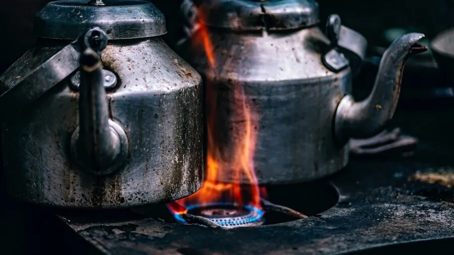 Steam rising from cooking food in a kitchen, showing heat and air circulation in action