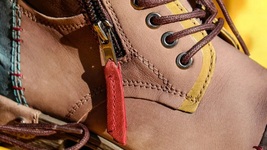 Various shoes of different heights and styles organized together in a home storage space