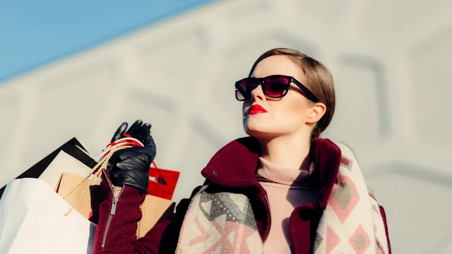Woman comparing clothing options while shopping, considering value and quality in fashion decisions