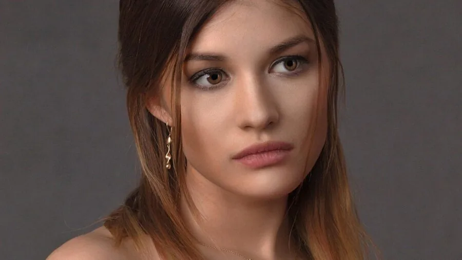 Woman examining beauty products with different price points and considering purchasing decisions
