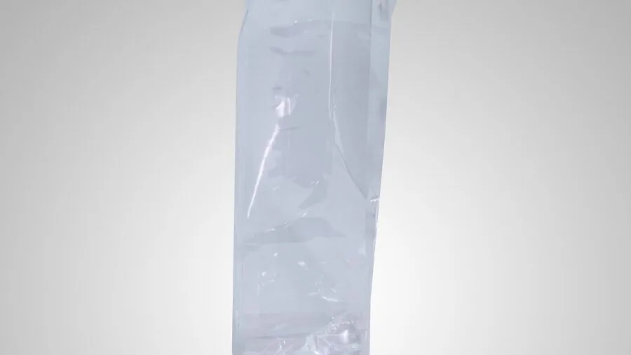 Woman folding and organizing lightweight fabric into her everyday tote bag for portability