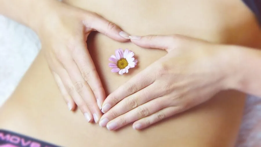 Woman in bathroom checking health and wellness routine, natural lifestyle moment