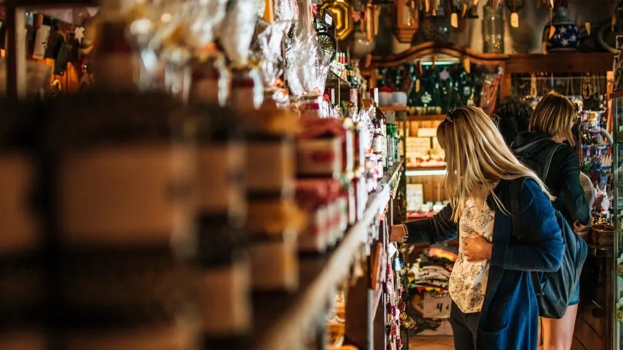Woman selecting fragrance for daily wear, demonstrating perfume choice for different occasions and lifestyle needs