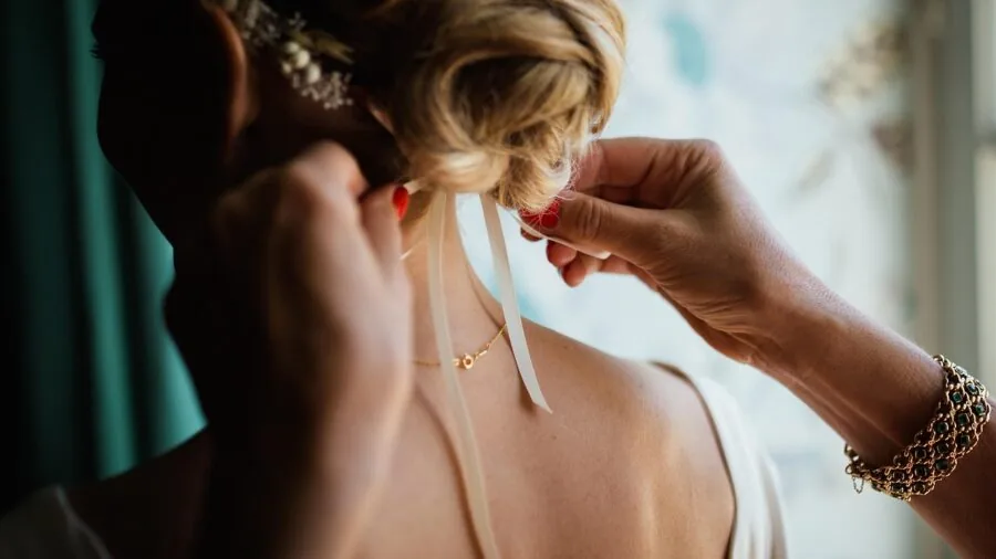 Woman with stud earrings in natural lighting, showing everyday jewelry styling and comfort