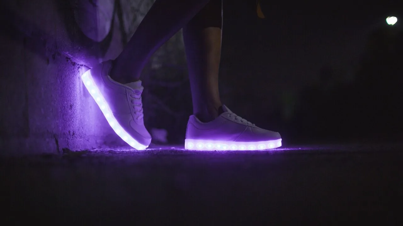 Women's walking shoes worn on feet, showing comfort and style for everyday wear