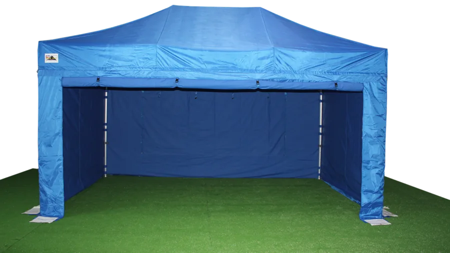 Young child easily setting up a colorful pop-up play tent outdoors in backyard during daytime